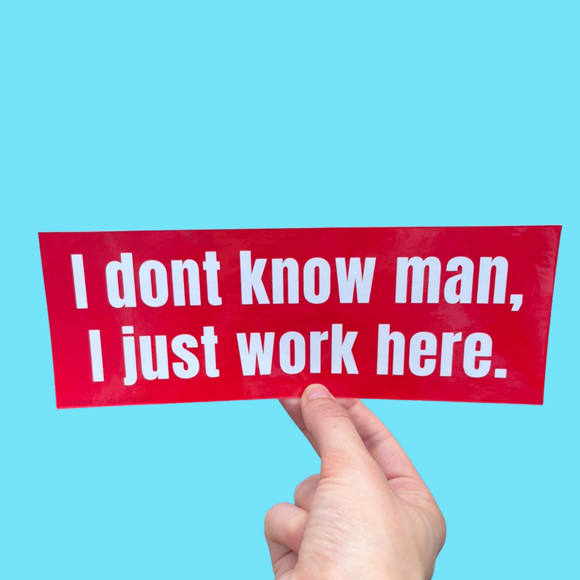 “Funny vinyl bumper sticker that says ‘I don't know man I just work here’ — waterproof and UV-protected, perfect for cars.”