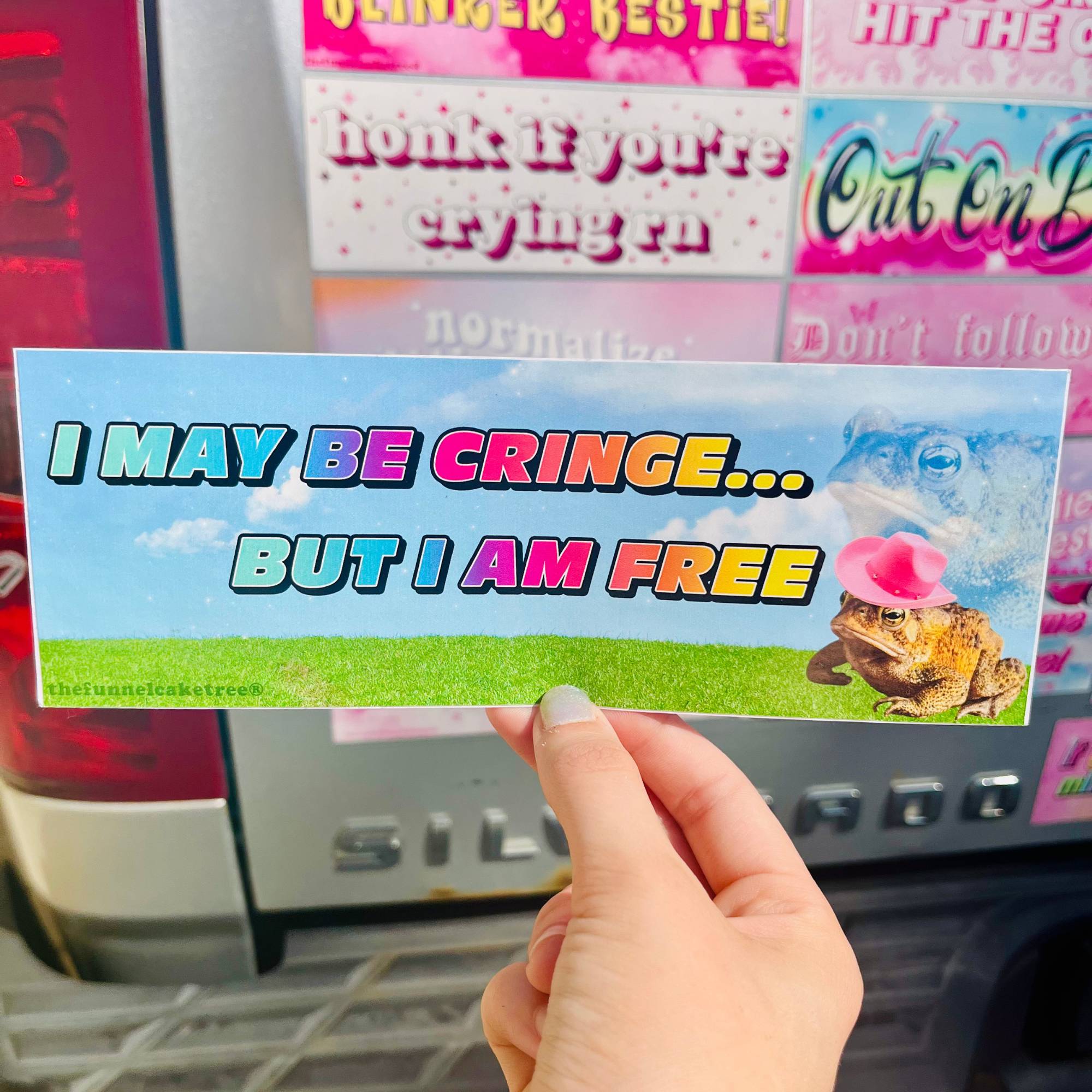 Funny vinyl bumper sticker that says ‘I may be cringe but I am free’ — waterproof and UV-protected, perfect for cars.