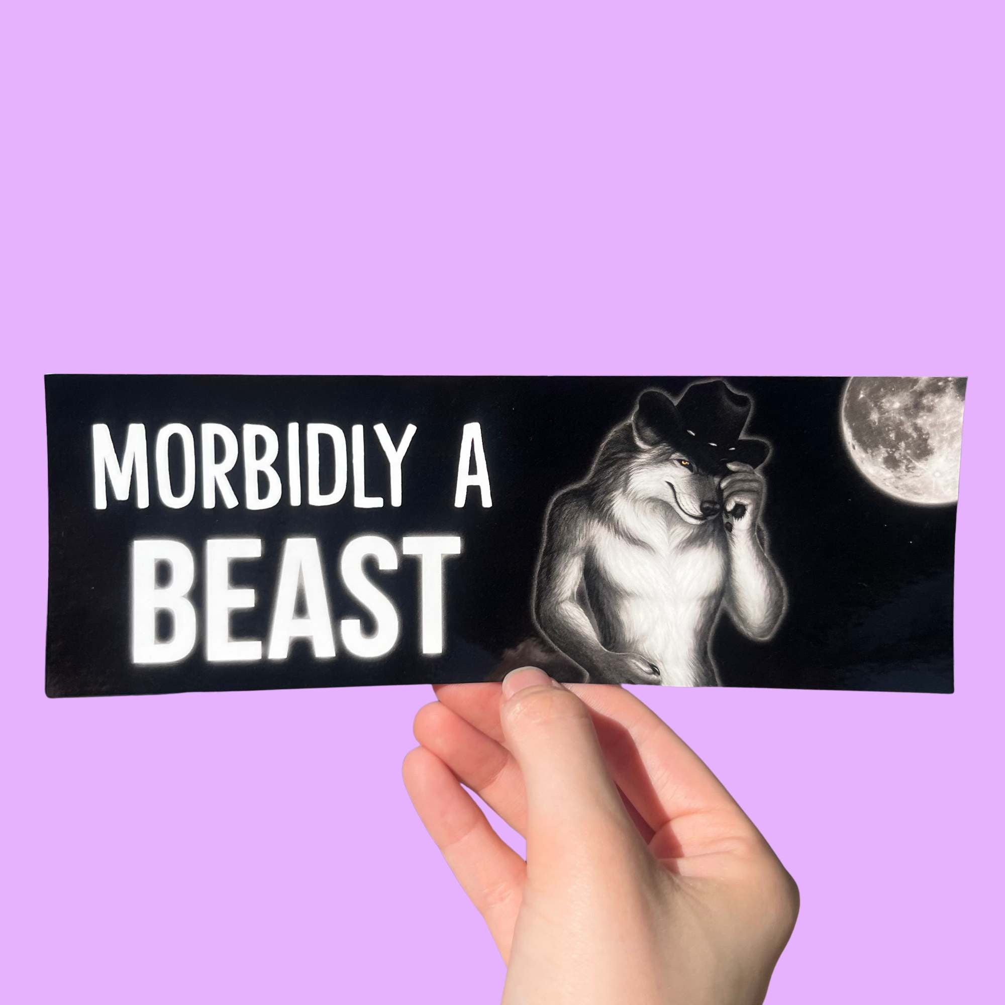 “Funny vinyl bumper sticker that says ‘Morbidly a Beast’ — waterproof and UV-protected, perfect for cars.”