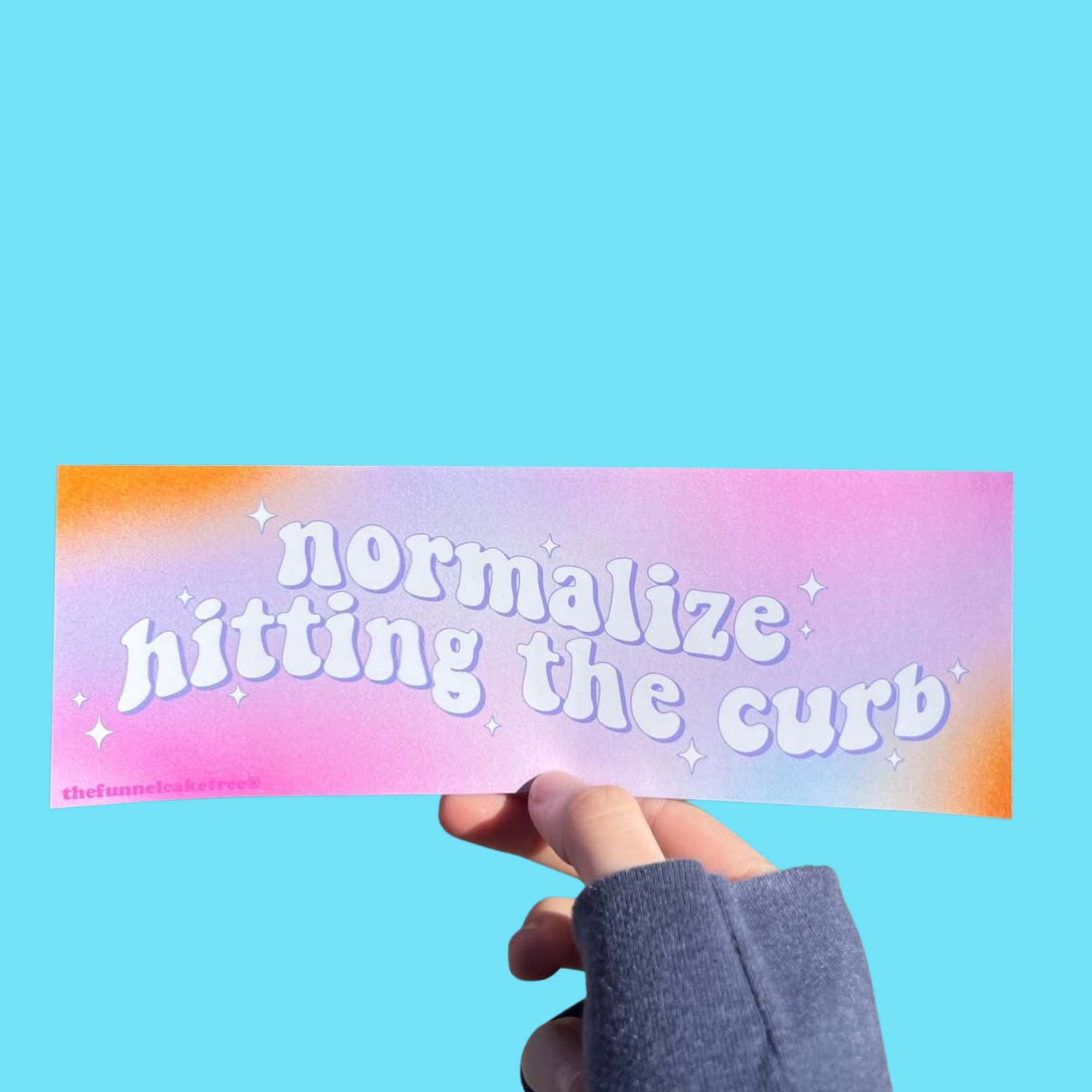 “Funny vinyl bumper sticker that says ‘Normalize Hitting The Curb’ — waterproof and UV-protected, perfect for cars.”