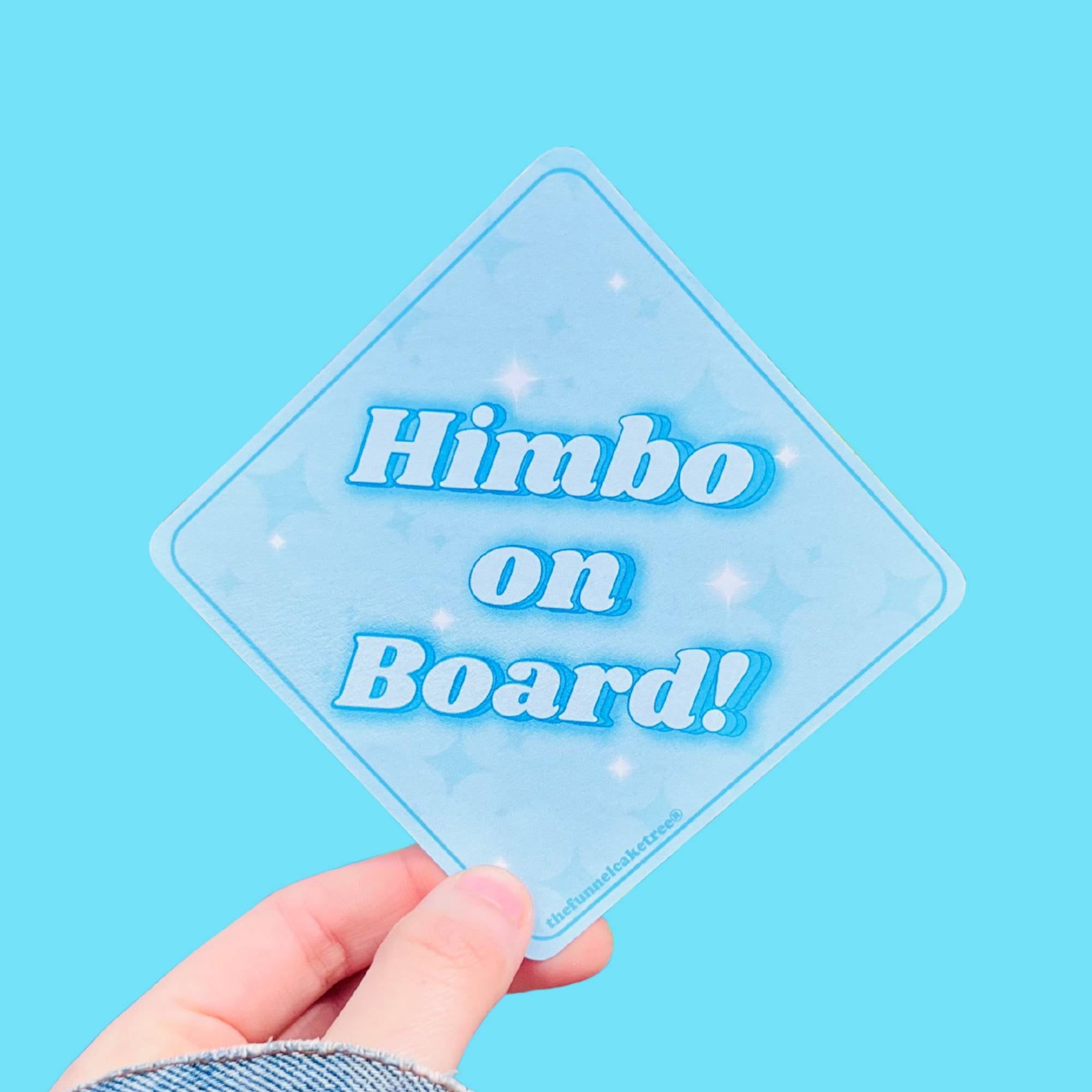  “Funny vinyl bumper sticker that says ‘Himbo on Board’ — waterproof and UV-protected, perfect for cars.”
