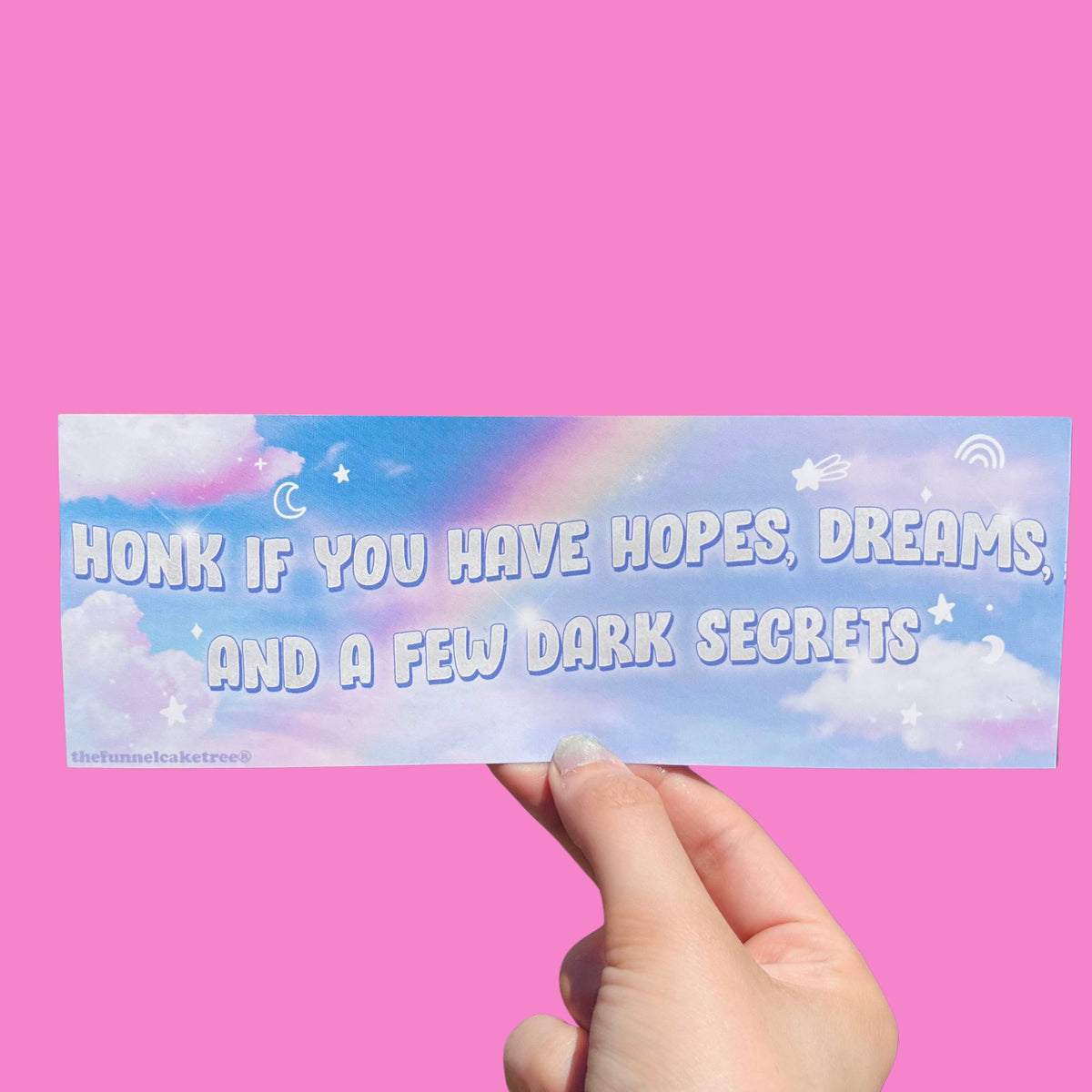 Pastel bumper sticker reading Honk if you have hopes dreams and a few dark secrets