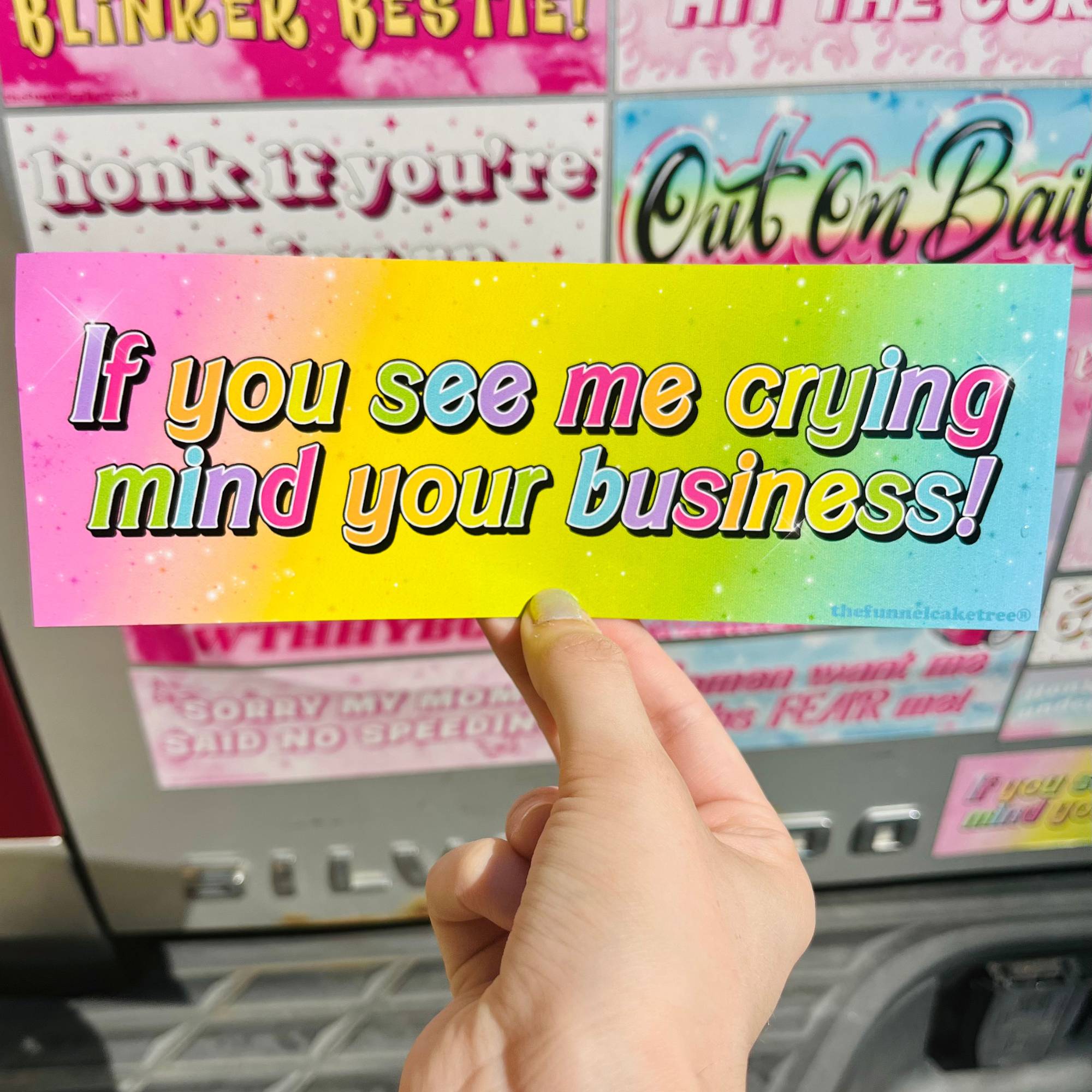  “Funny vinyl bumper sticker that says ‘If you see me crying mind your business’ — waterproof and UV-protected, perfect for cars.”
