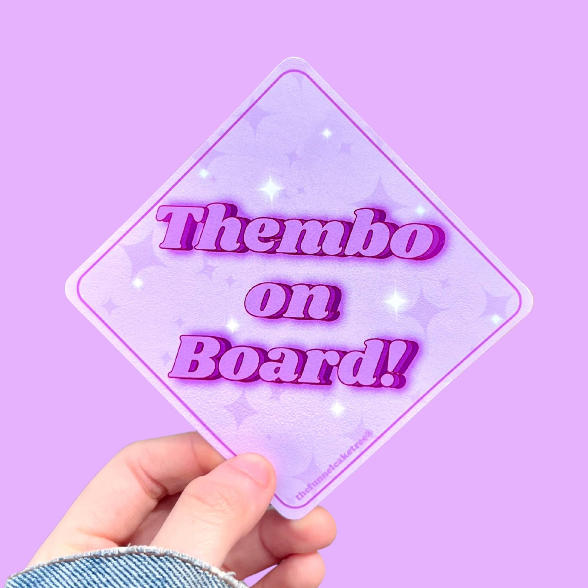  “Funny vinyl bumper sticker that says ‘Thembo on Board’ — waterproof and UV-protected, perfect for cars.”