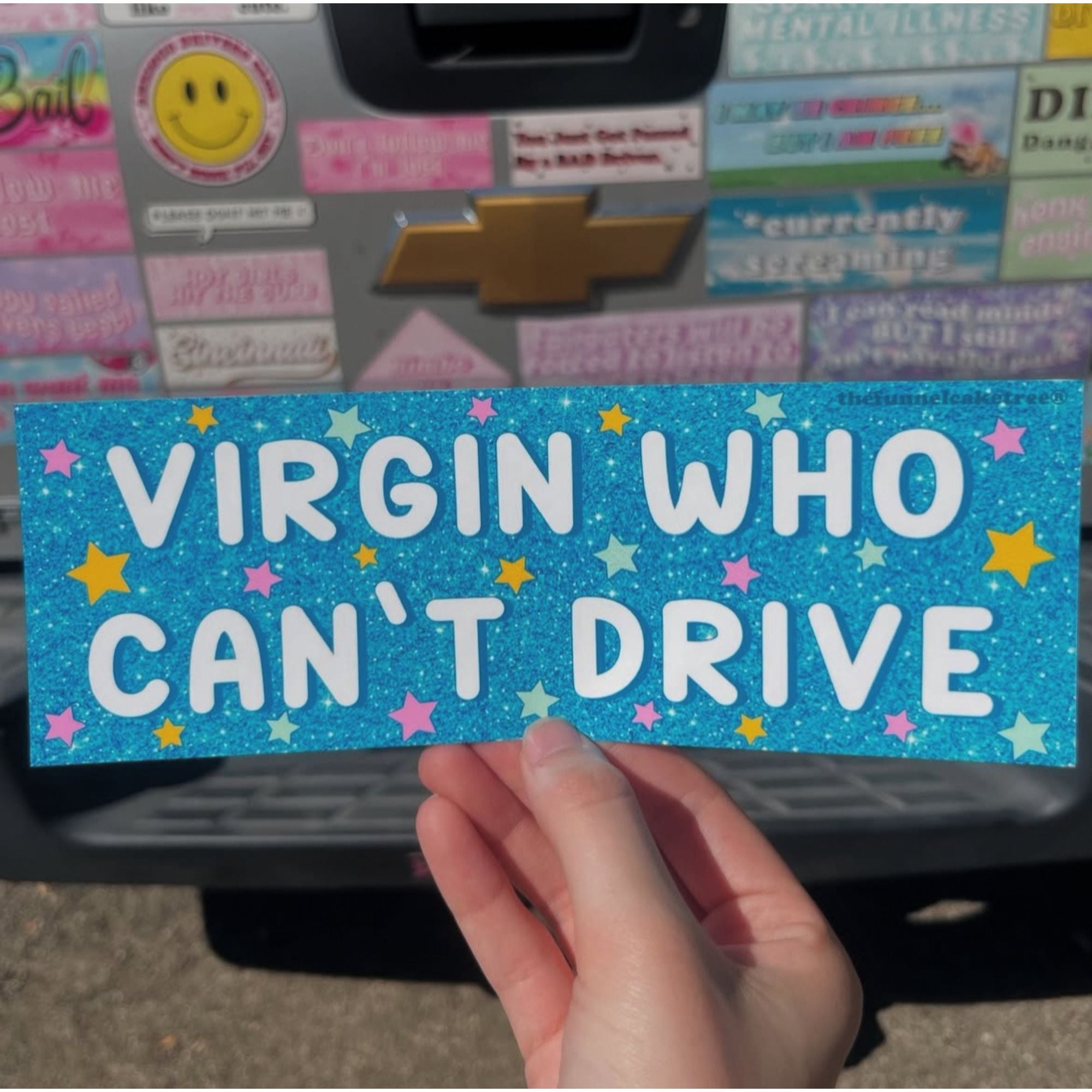 “Funny vinyl bumper sticker that is blue that says ‘Virgin who can't drive’ — waterproof and UV-protected, perfect for cars.”