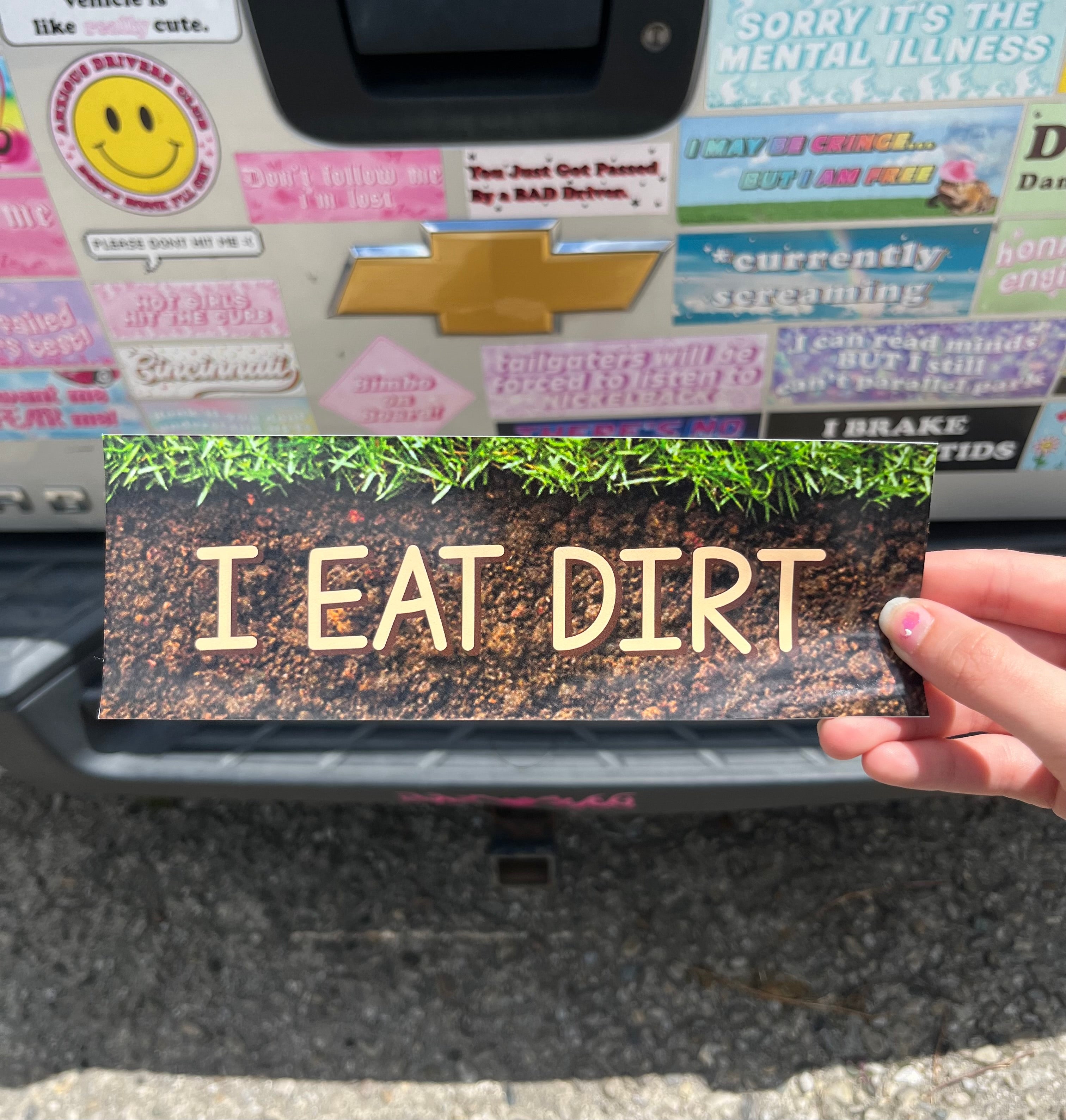 
 “Funny vinyl bumper sticker that says ‘I EAT DIRT’ — waterproof and UV-protected, perfect for cars.”
