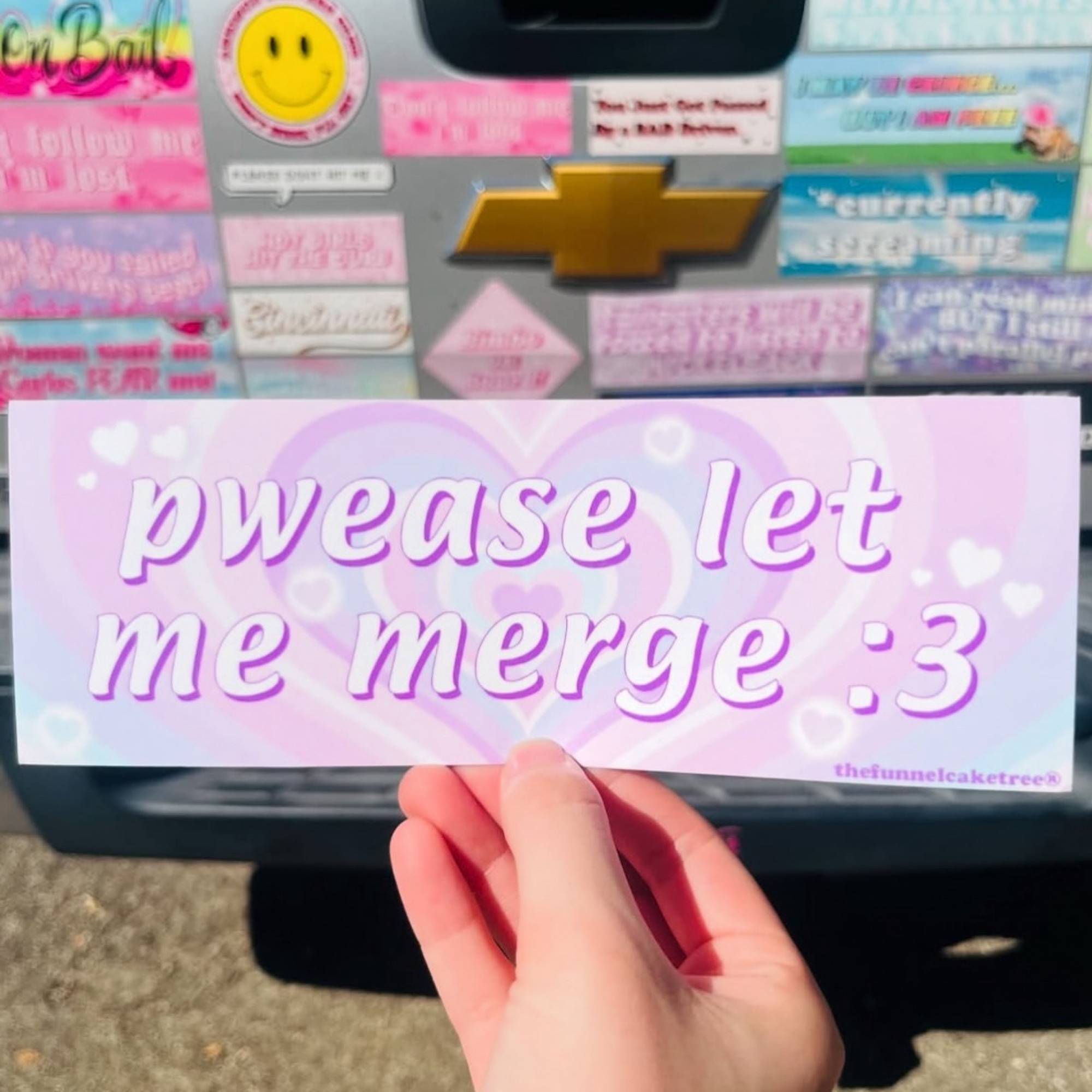 “Funny vinyl bumper sticker that is blue that says ‘please let me merge :3’ — waterproof and UV-protected, perfect for cars.”