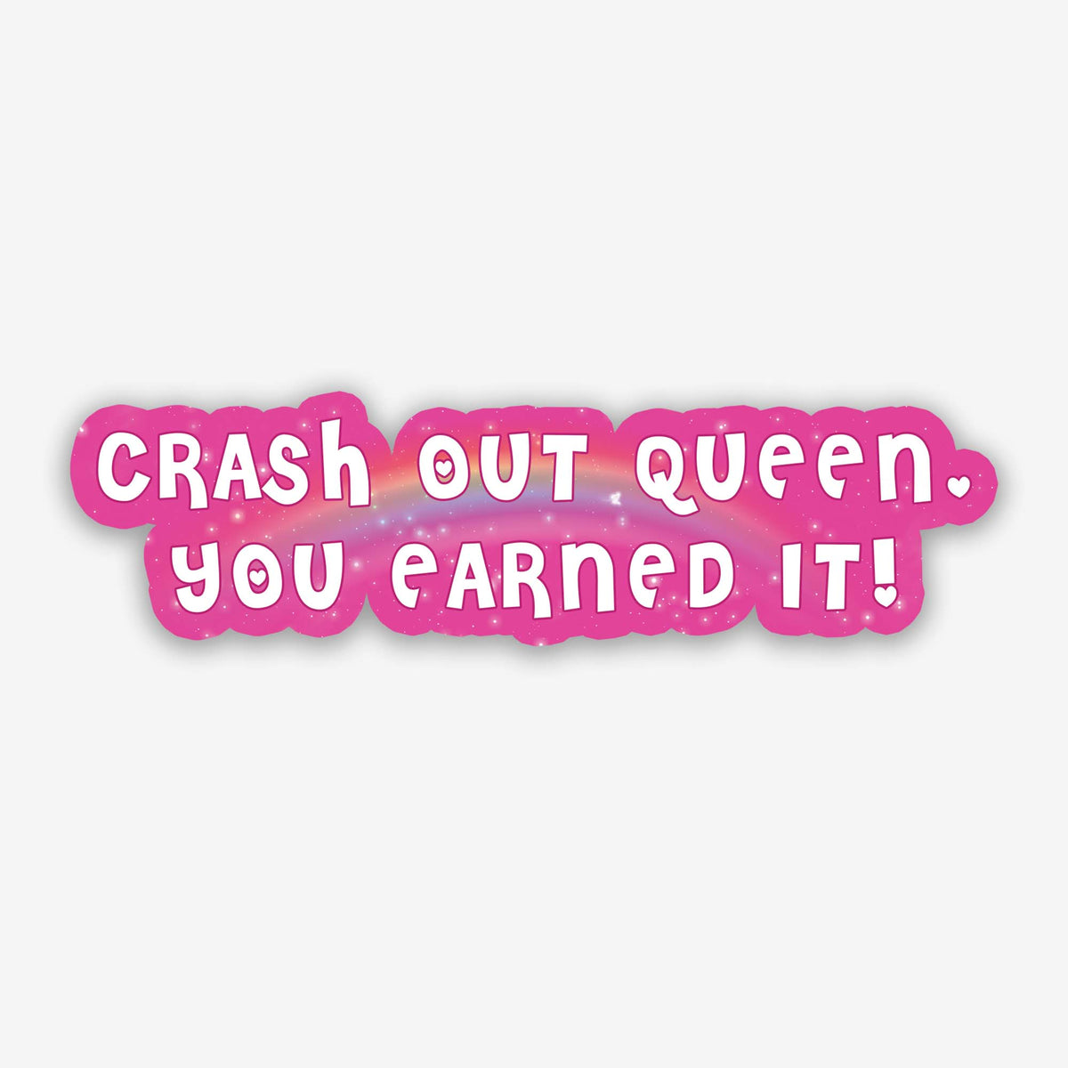 Pink die-cut sticker with white text reading Crash Out Queen You Earned It! over a sparkly rainbow background.