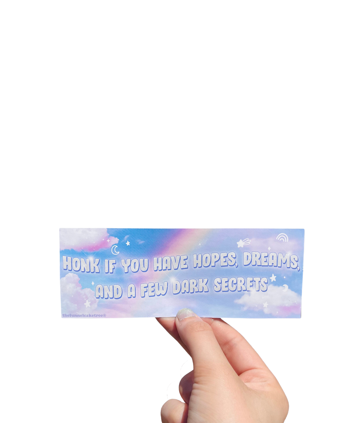 Hand holding a cloudy pastel mini sticker reading 'Honk if you have hopes, dreams and a few dark secrets.'