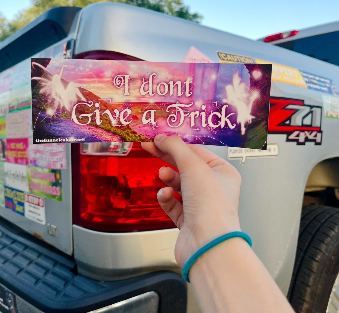 I don't give a frick funny bumper sticker held in front of a truck