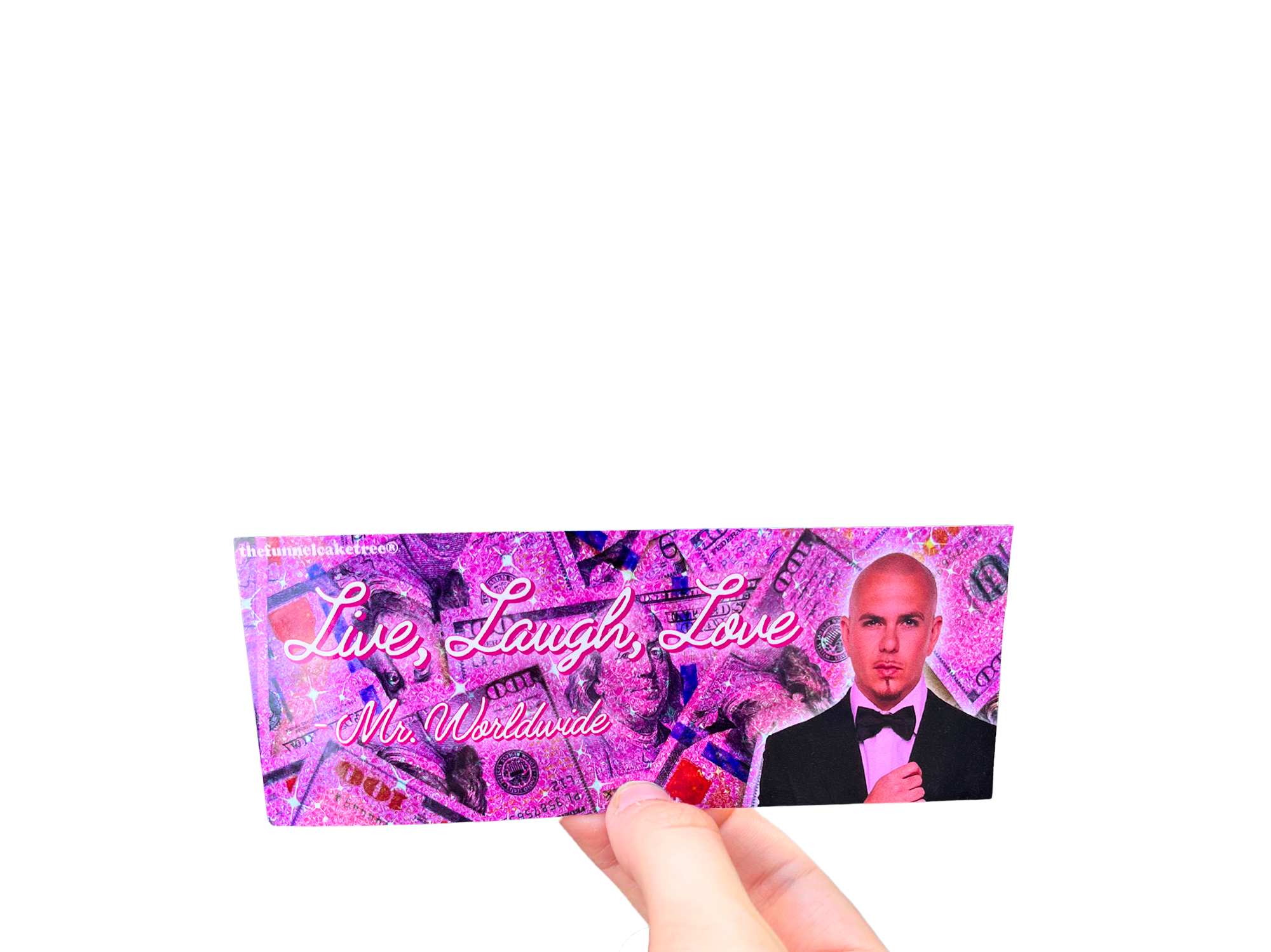 Hand holding a pink 'Live Laugh Love Mr. Worldwide' mini bumper sticker with a man's portrait.