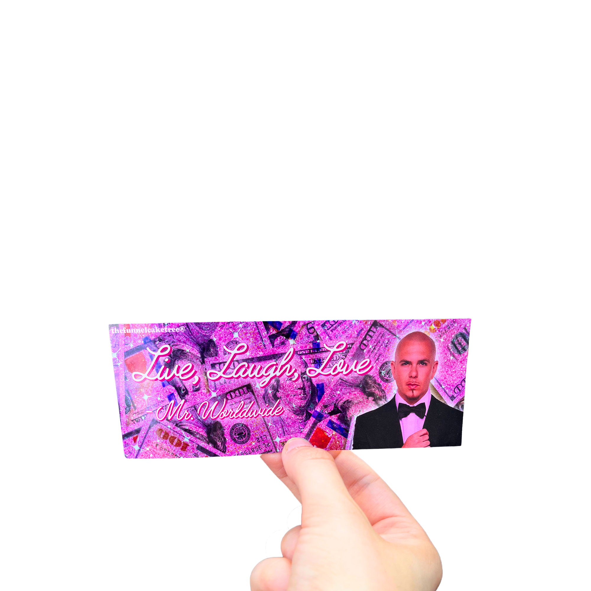 Hand holding a pink 'Live Laugh Love Mr. Worldwide' mini bumper sticker with a man's portrait.