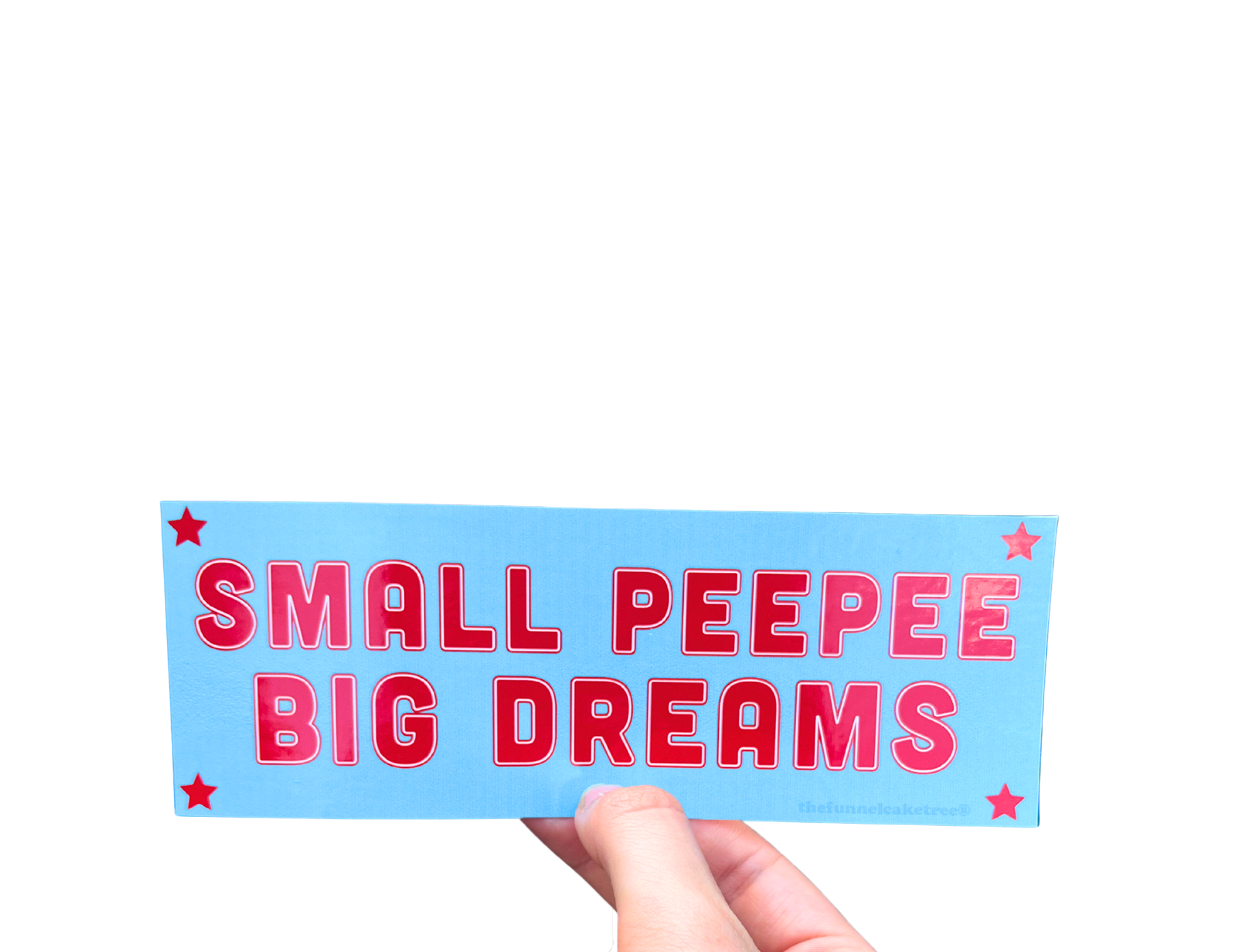 Hand holding a blue mini bumper sticker reading 'SMALL PEEPEE BIG DREAMS' in red letters with stars.