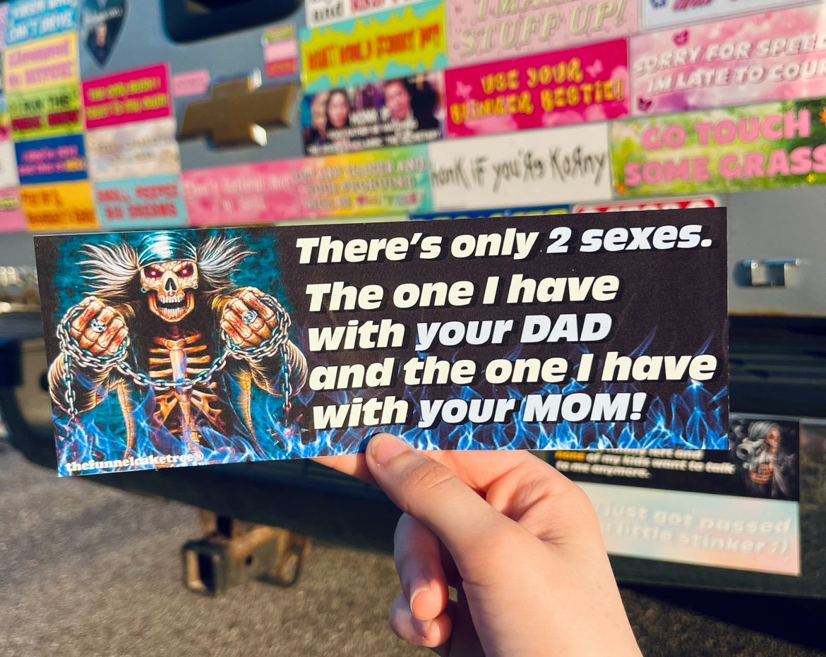 There’s only two sexes funny bumper sticker held in front of a truck