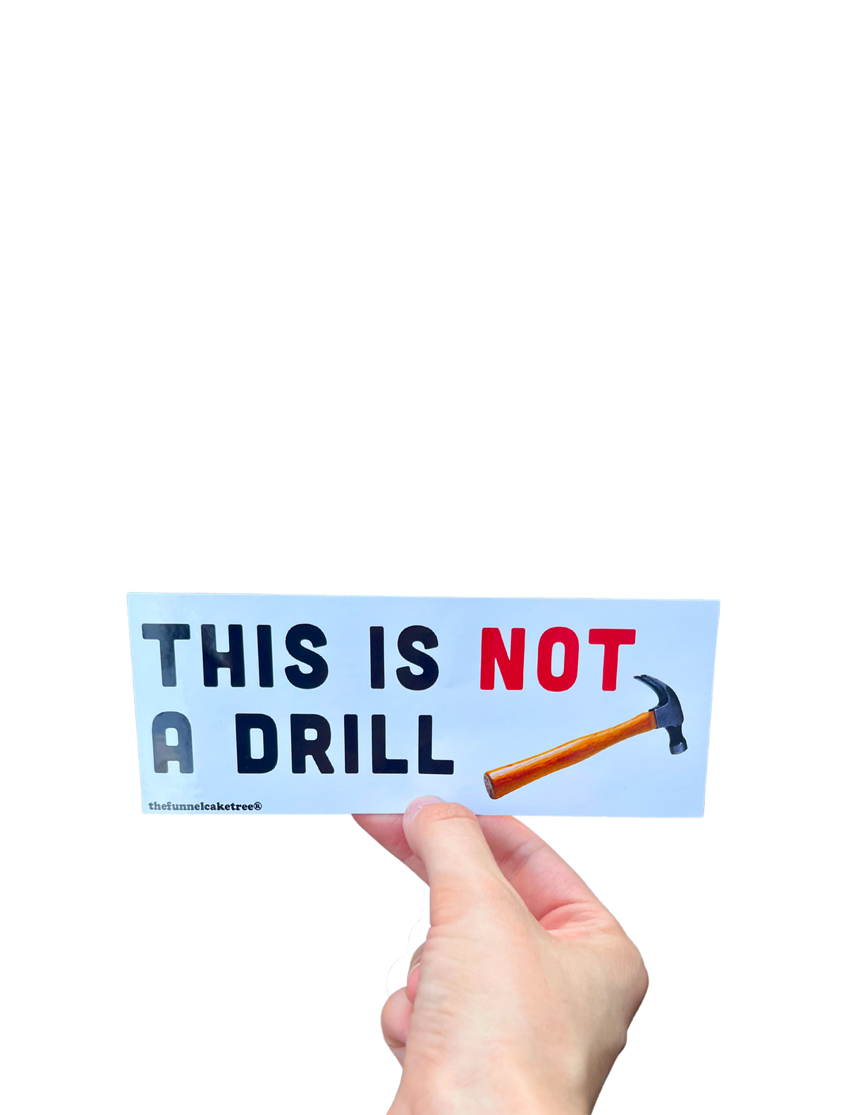 Hand holding a light blue 'This is NOT a drill' mini bumper sticker with an illustrated hammer.