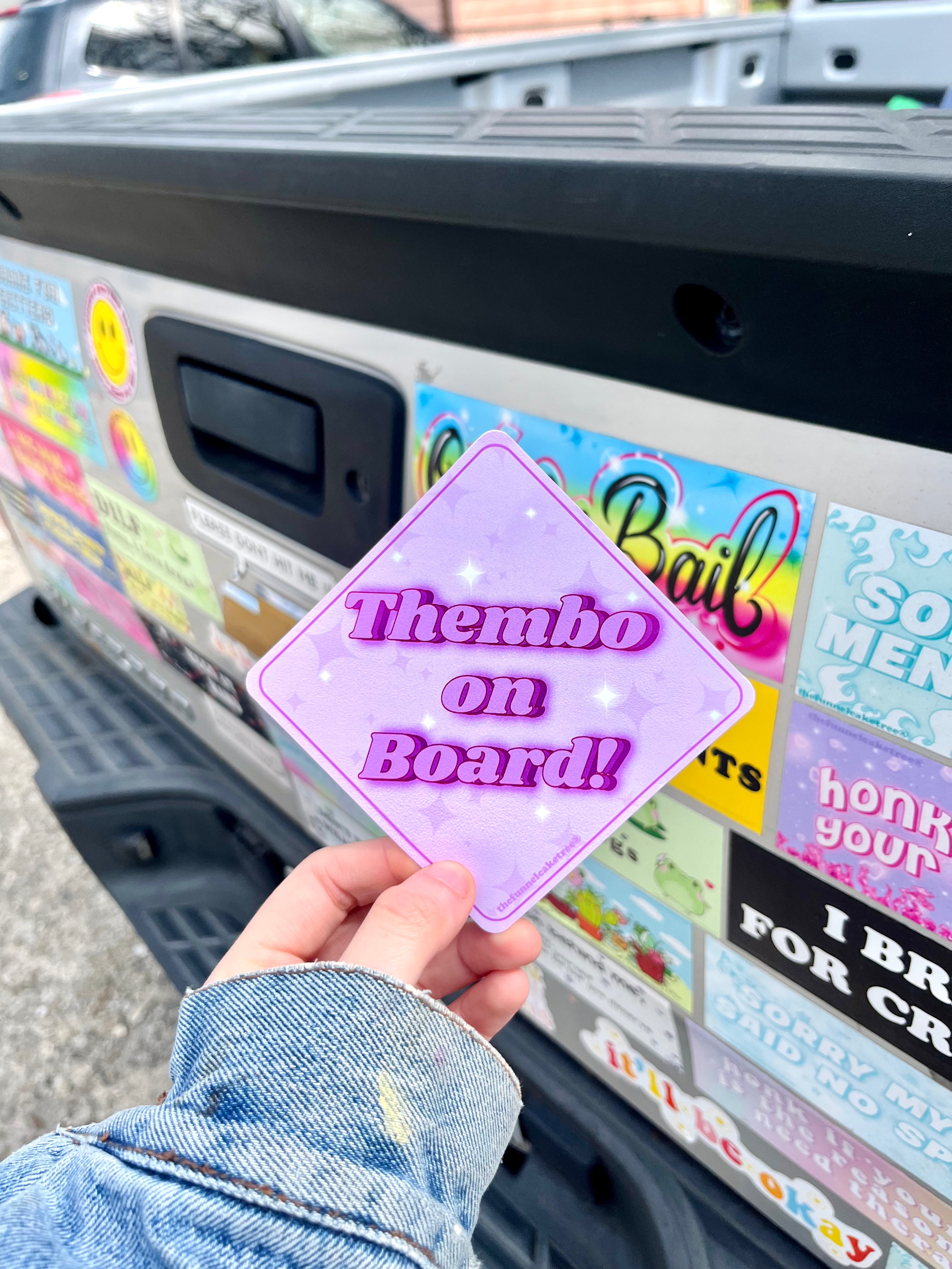  “Funny vinyl bumper sticker that says ‘Thembo on Board’ — waterproof and UV-protected, perfect for cars.”
